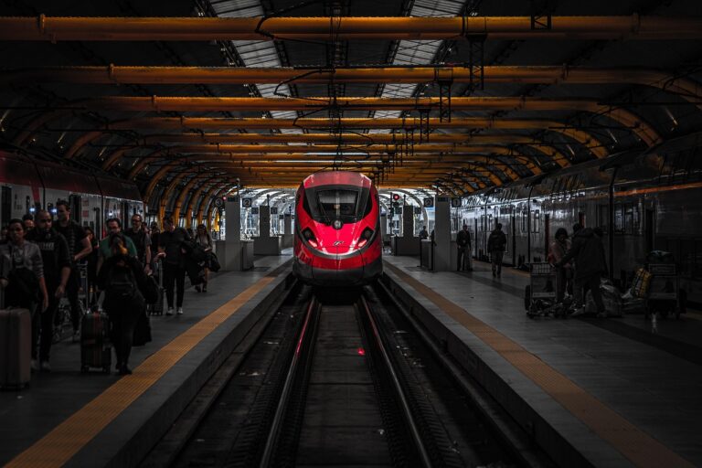 Haramain high-speed train at platform with pilgrims boarding