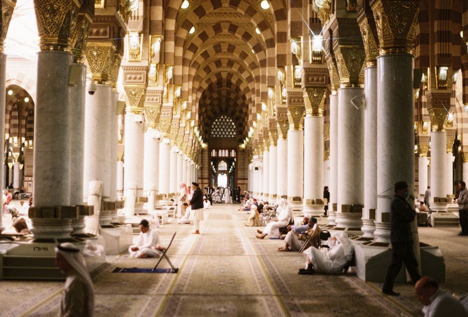 Prophet's Mosque in Madinah with pilgrims in the courtyard