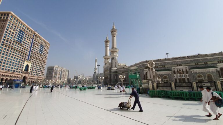 Wide angle landscape view of Makkah holy mosque at dusk