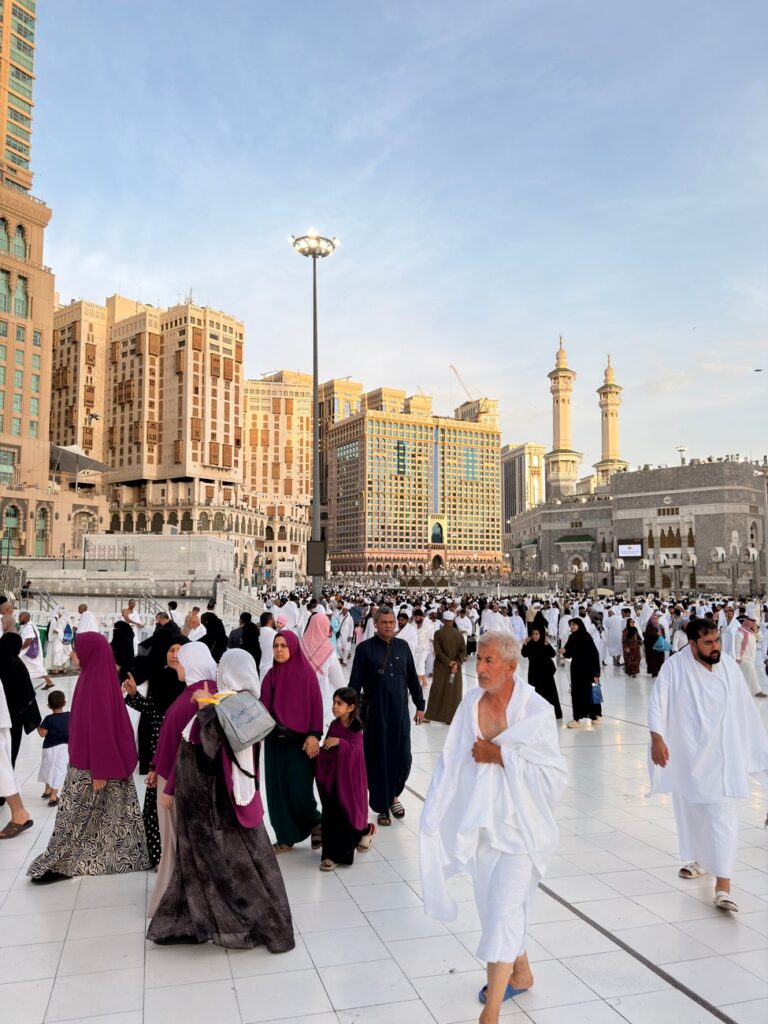 Muslim pilgrims gathering near Masjid al-Haram in Makkah