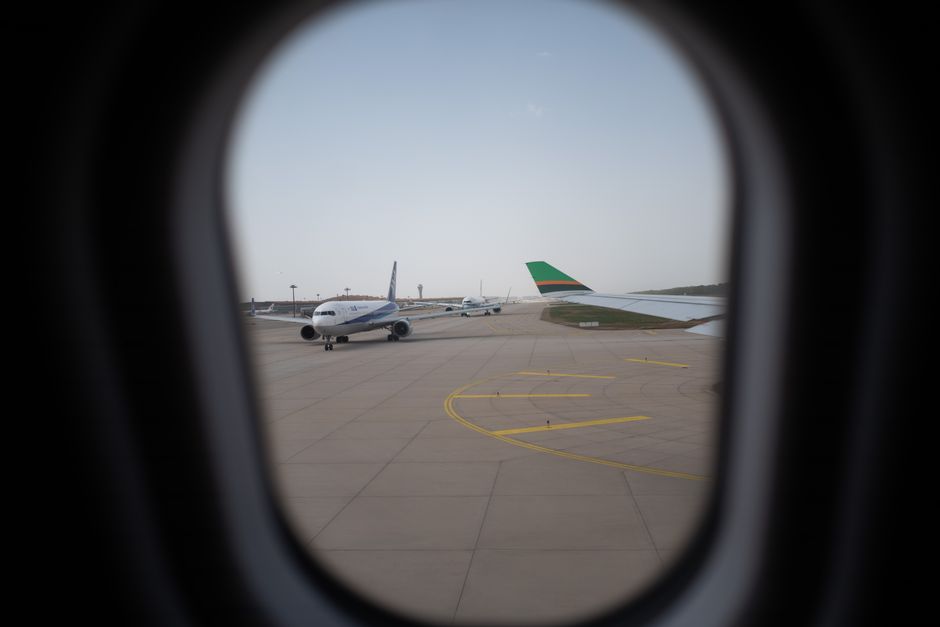 Commercial airplane at airport terminal