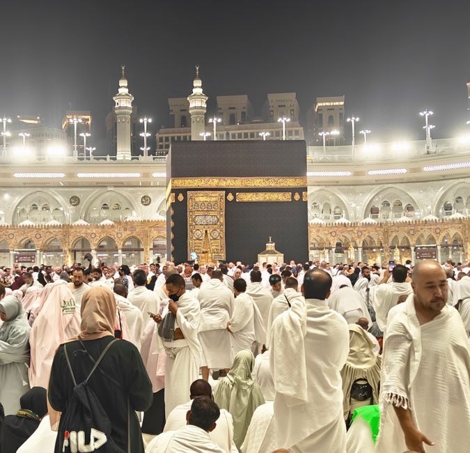 Pilgrims gathered around the Kaaba in Mecca, Saudi Arabia at night