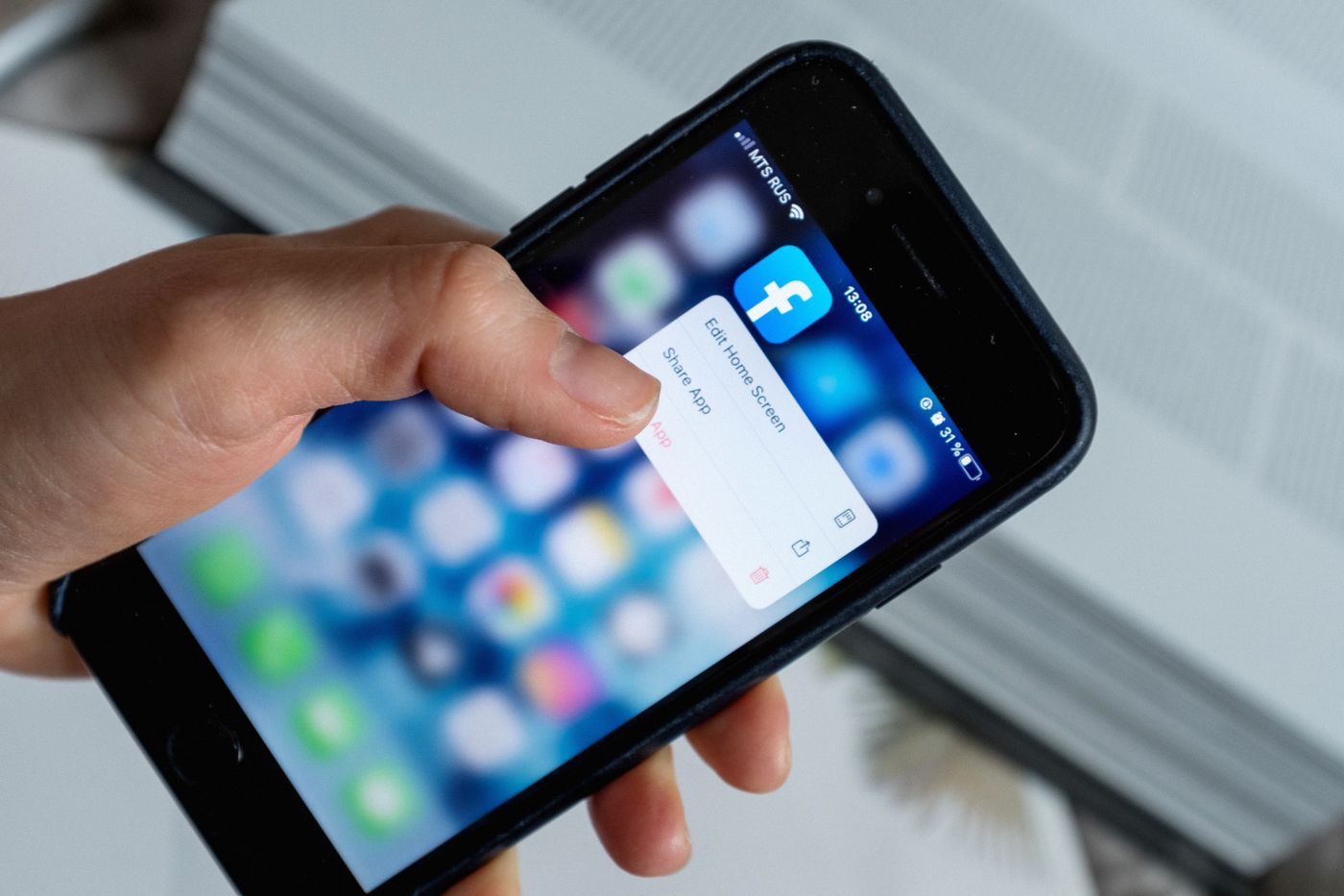Traveller using a smartphone application before an Umrah trip